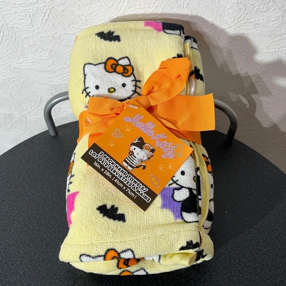 Hello Kitty NEW - 2 hand towels - Yellow with kitty costume and bats